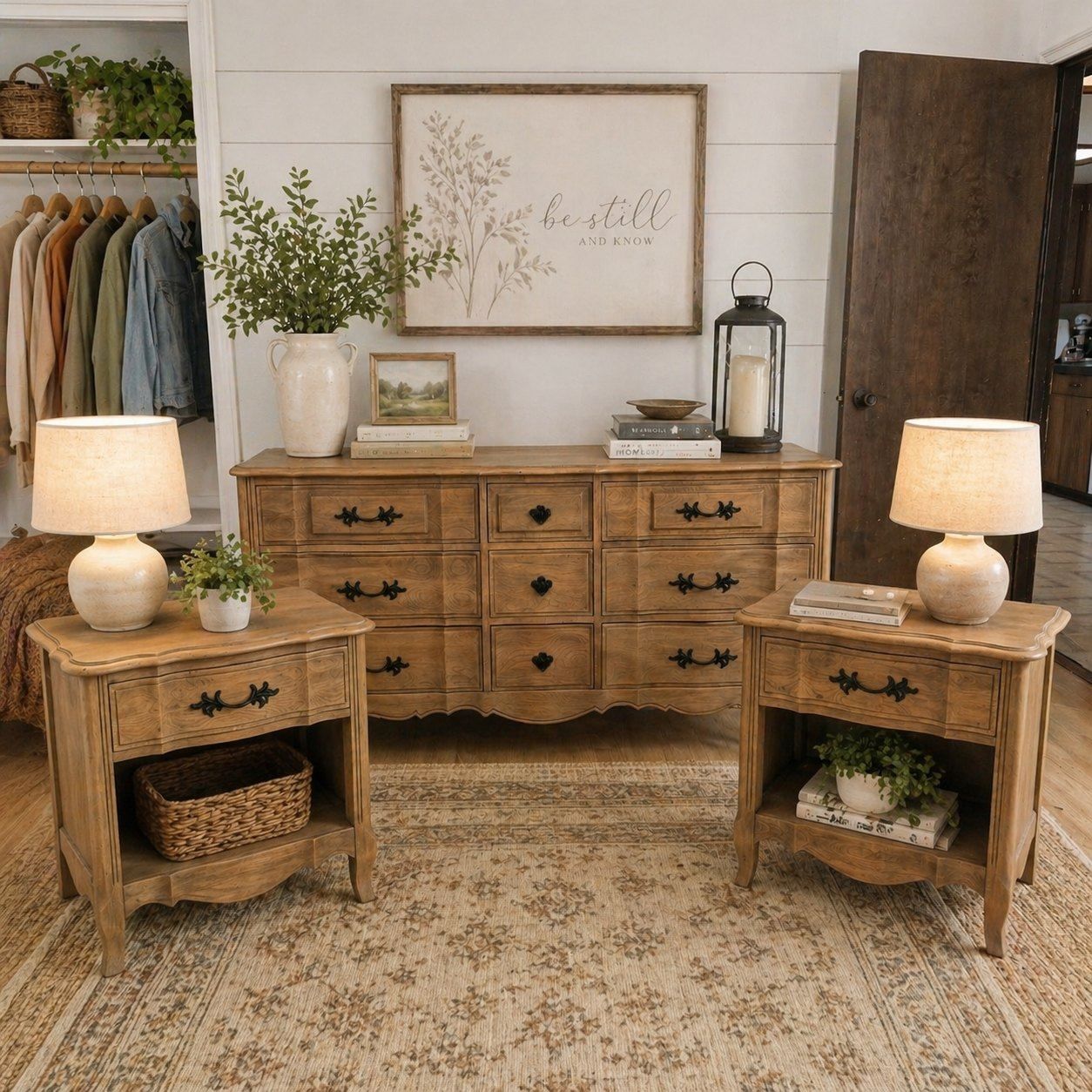 Finished natural bedroom set styled with dresser, matching nightstands, lamps, and warm decor