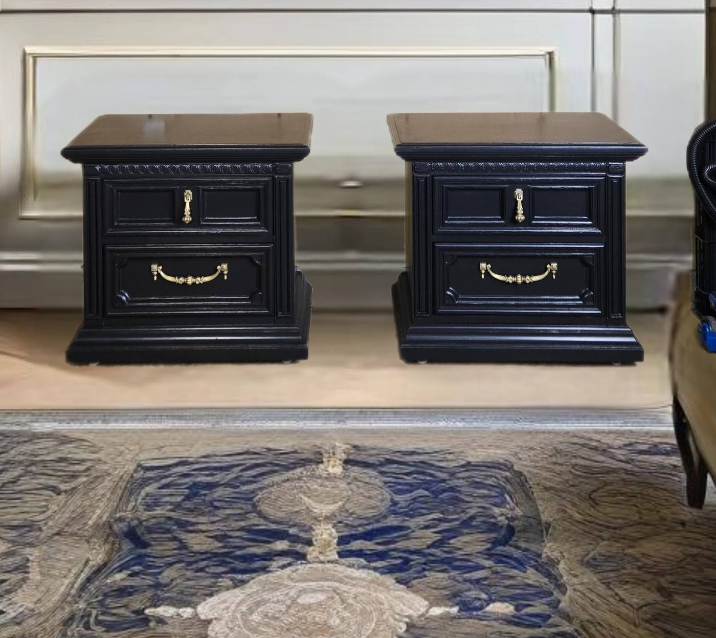 Black nightstand pair with gold hardware