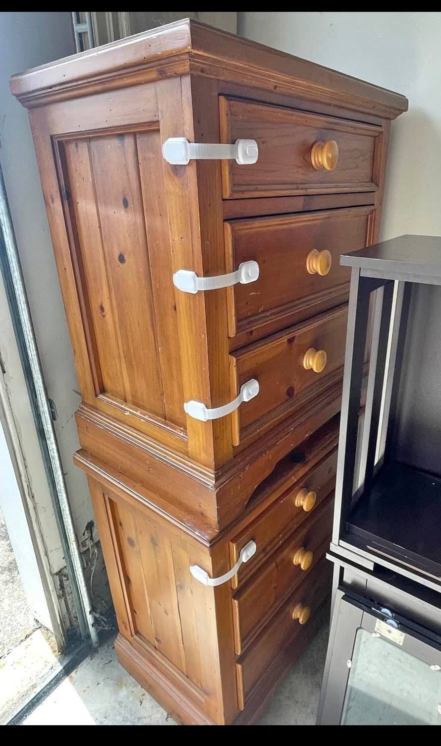 Stacked amber nightstands before restoration