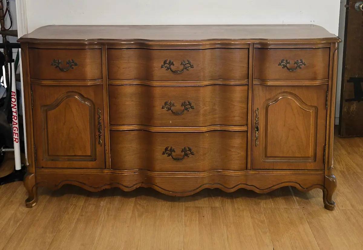 Long brown dresser before sage floral furniture transformation